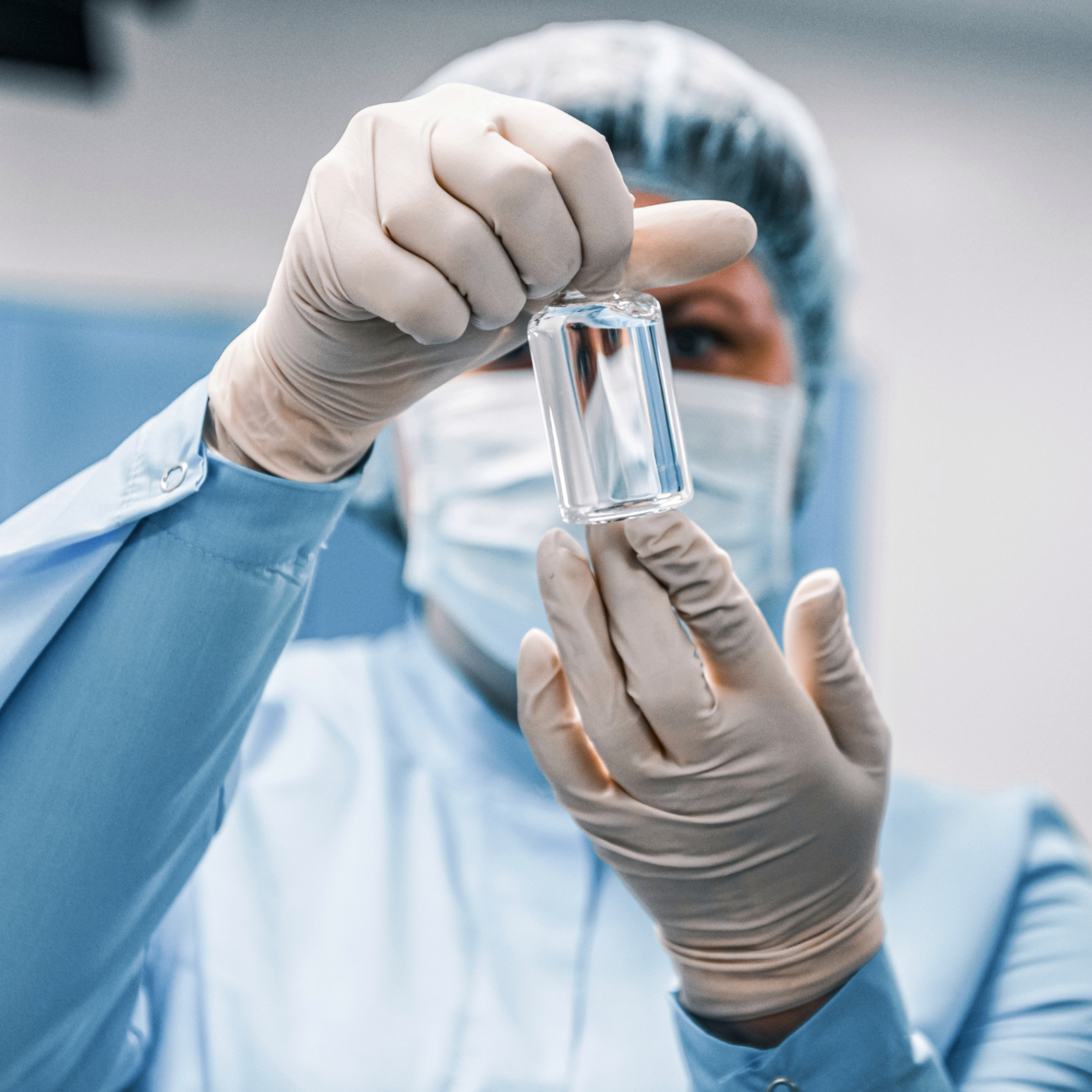 Clinician preparing a regenerative biologic injection